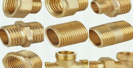 Brass PPR pipe fittings including elbows, tees, and threaded connectors for plumbing systems